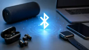 Ilustracija Bluetooth povezivanja između bežičnih slušalica, pametnog sata, telefona, laptopa i zvučnika.
