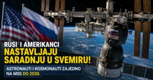 Međunarodna svemirska stanica iznad Zemlje sa zastavama SAD i Rusije i brodom Sojuz